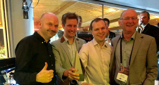 ESB Chris Mooney, Senior Energy Services Product Manager and Denis O'Leary, Head of Innovation, with ev.energy Founders Nicholas Wooley and Chris Darby at the FREE ELECTRONS Grand Finale 2019